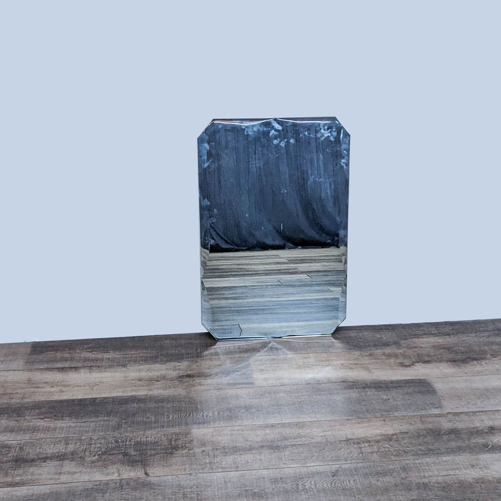 Back view of rectangular Remolino mirror with mounting fixtures.