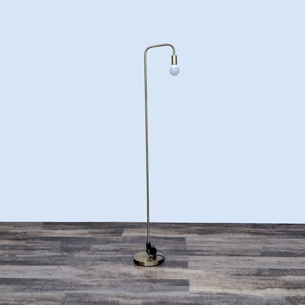 1. Modern Reperch floor lamp with a slender metallic frame and exposed bulb, standing on wooden flooring.
