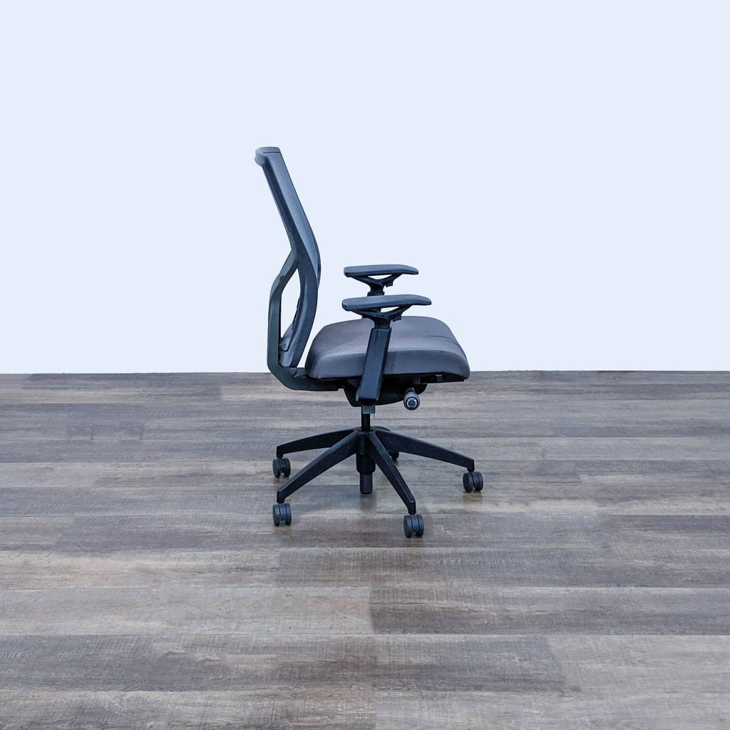 a black office chair with a black seat.