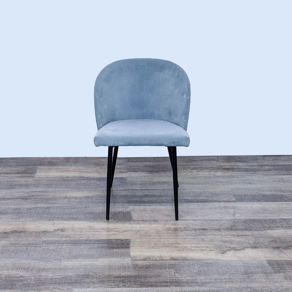 Terrace Living dining chair with curved back and velvet upholstery.