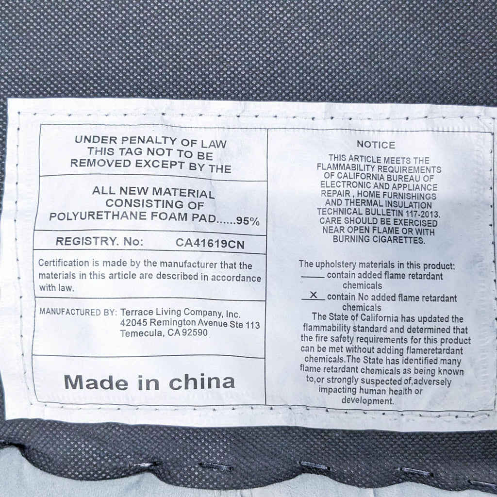 Fabric tag of Terrace Living chair, detailing materials and manufacture info.