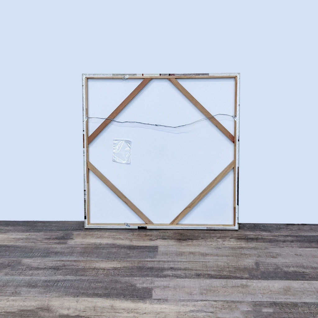 a wall with a picture of a person holding a clock 