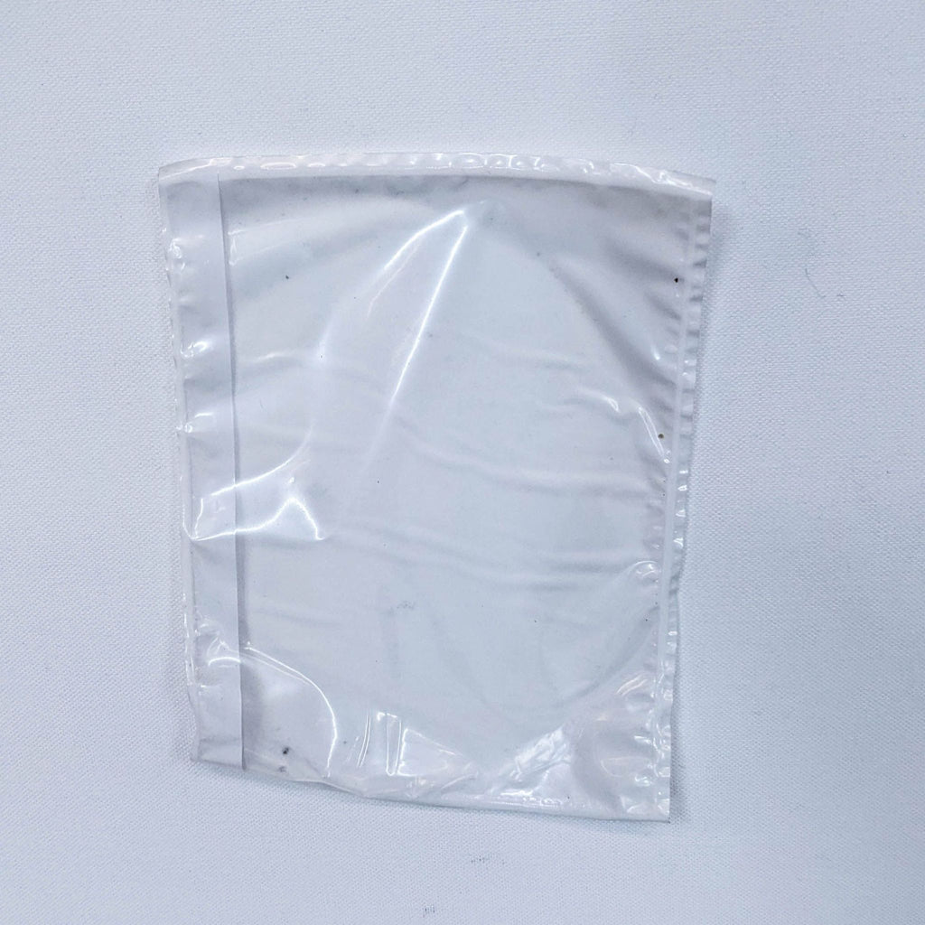 a piece of cloth with a tag on it 