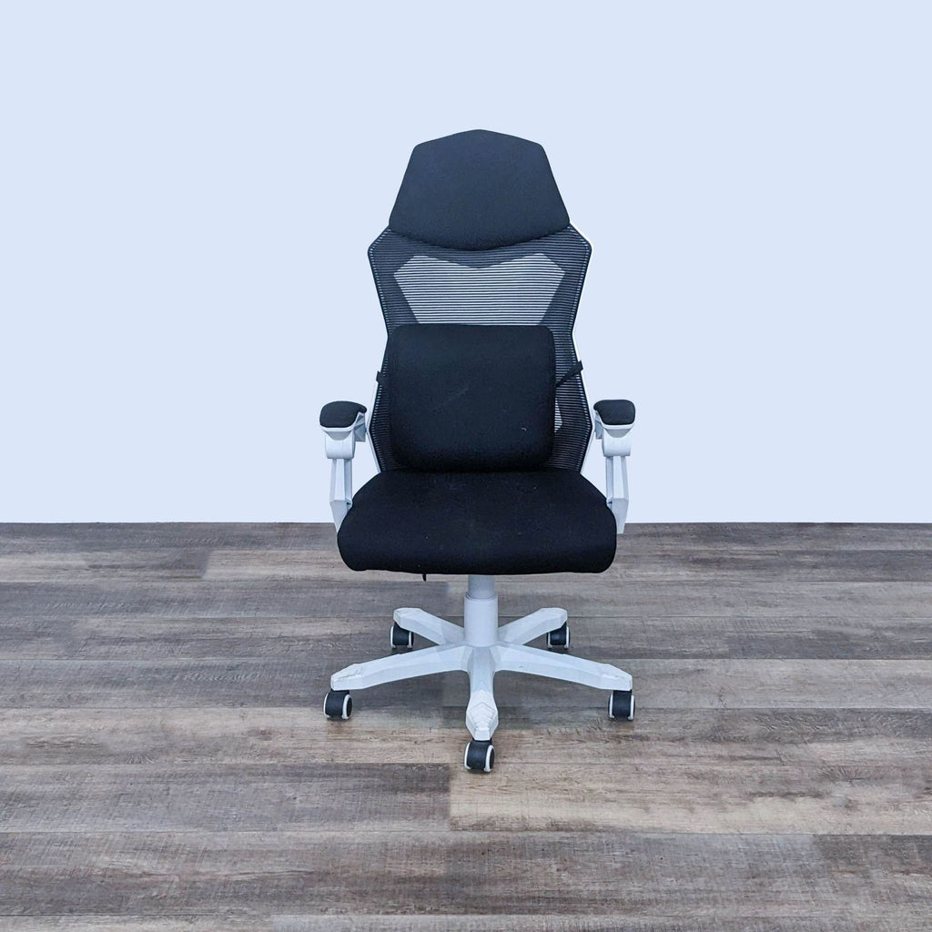 Front view of a modern gaming chair with cushioned seat and armrests.