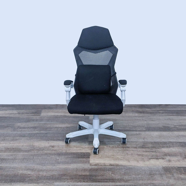 Front view of a modern gaming chair with cushioned seat and armrests.