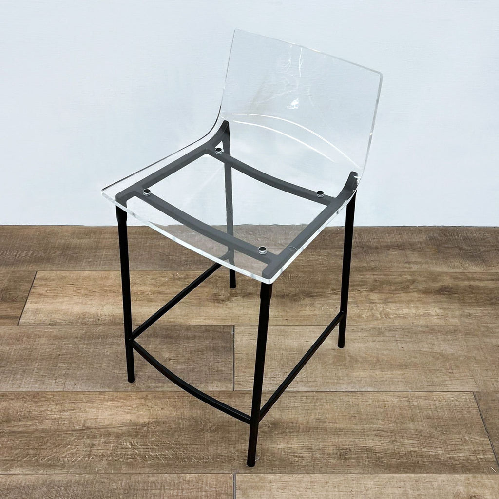 a chair with a clear seat.