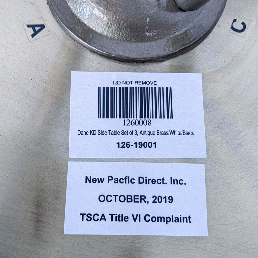 Barcode label with product details for New Pacific Direct side table.