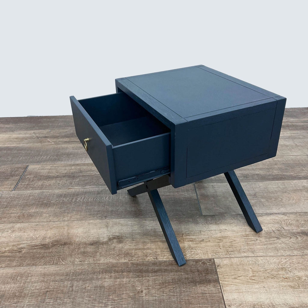 Blue Reperch End Table with open drawer and angled legs.  