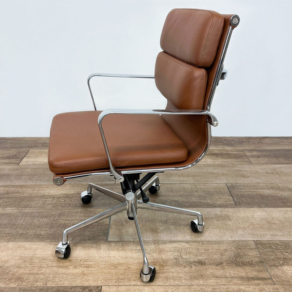 Side view of the Soho Management Chair showcasing the vegan leather and gas lift design.