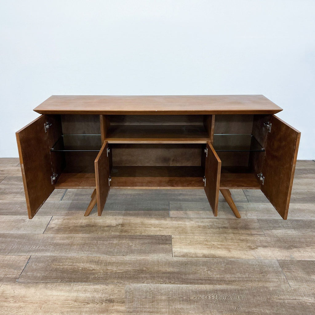Sideboard with open glass shelves and hinged cabinet doors by Reperch.