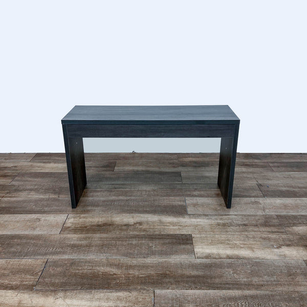 the coffee table is a modern coffee table with a black top.