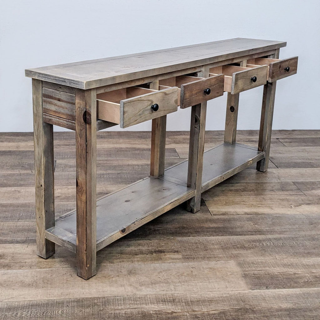 a rustic wood and metal desk with a shelf.