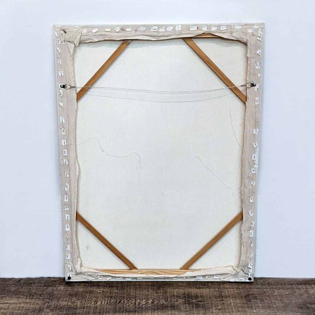 3. Back view of a stretched canvas artwork from the Prints & Maps category, showing mounting and wood frame.