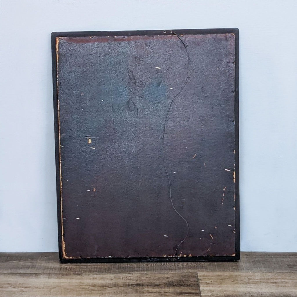 Back view of a Reperch wall mirror showing its sturdy structure.