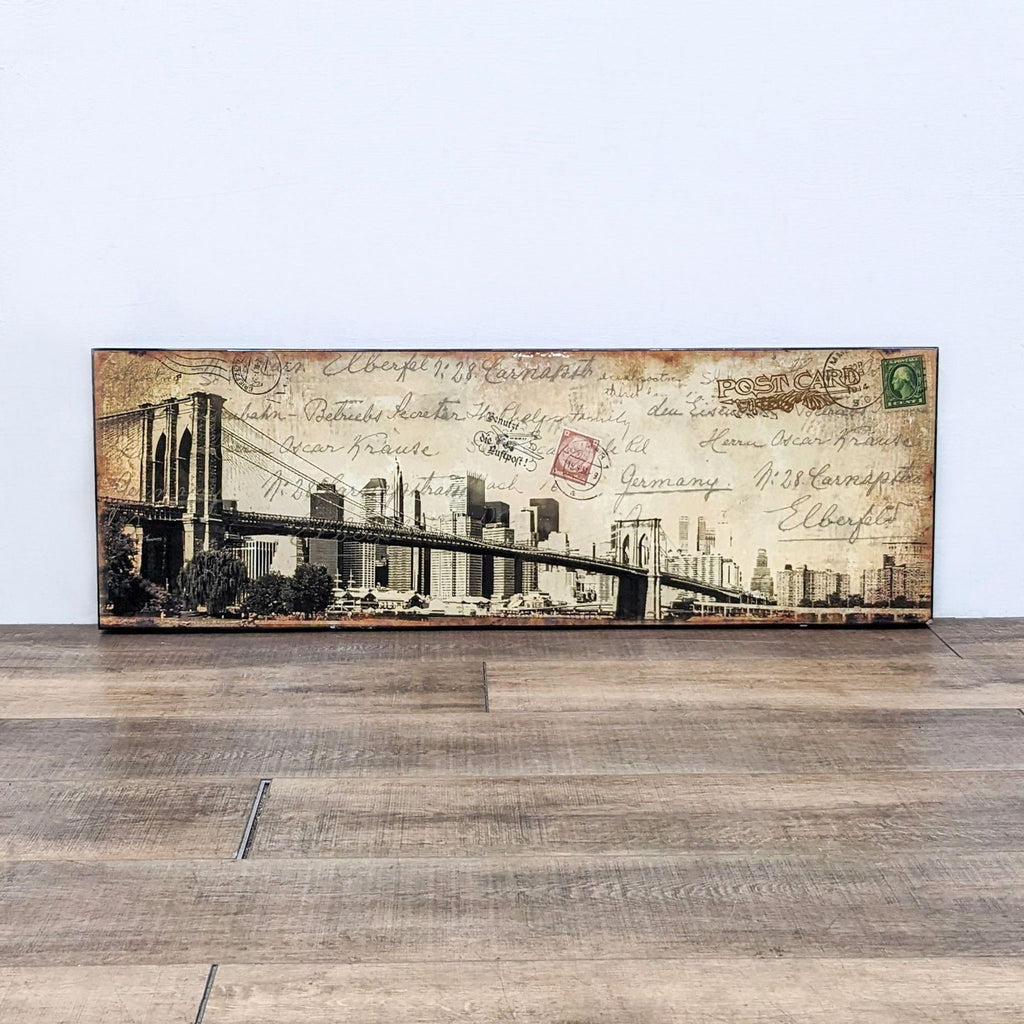 1. Art print of Brooklyn Bridge on a postcard design, mounted on wood veneer. Includes hanging hardware.