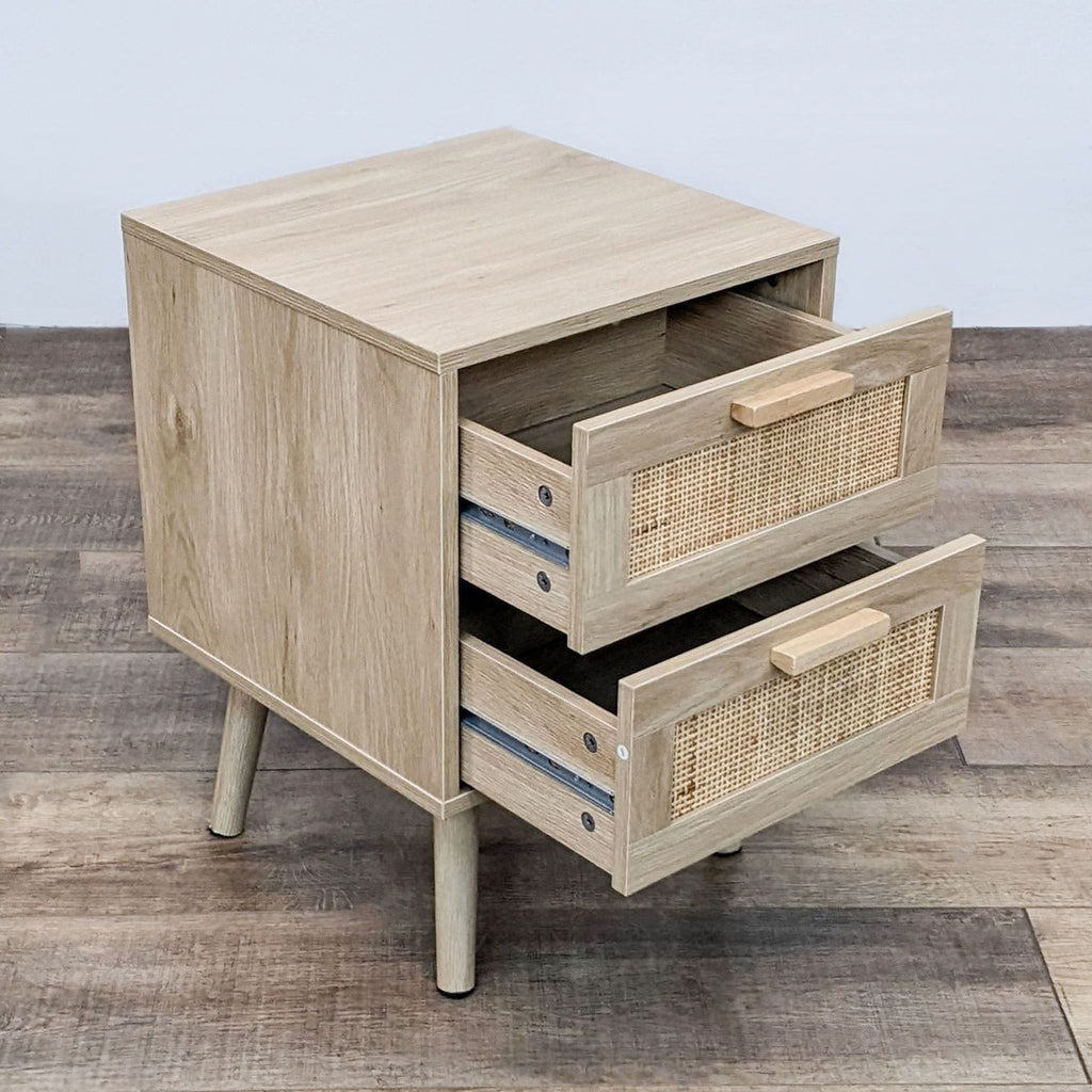 End table by Reperch, featuring rattan front drawers, top drawer open.