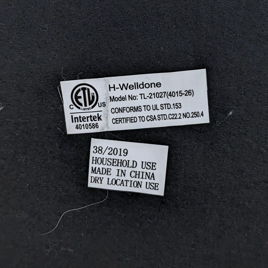 Certification labels on the lamp base indicating household use and manufacturing details.
