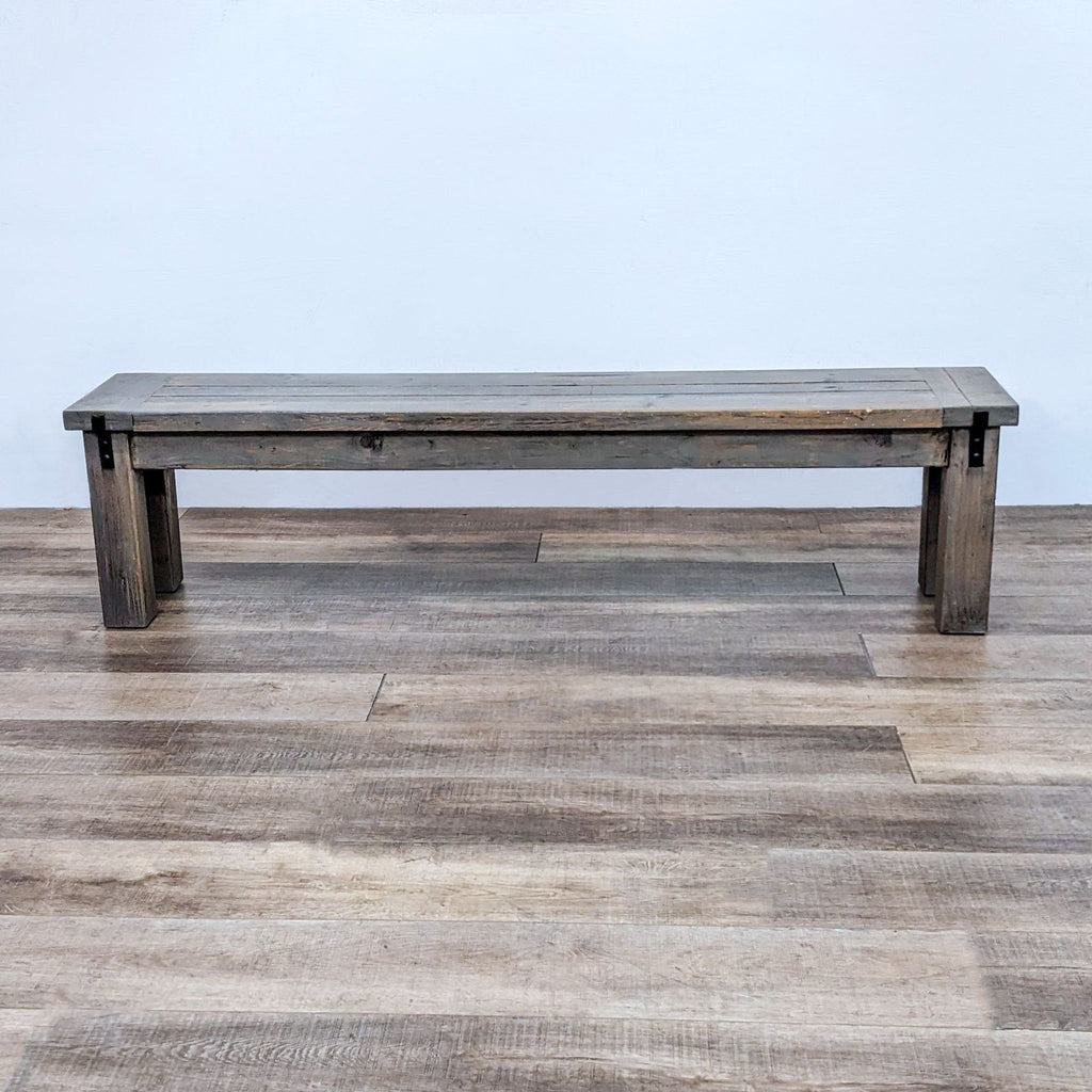 2. "Handcrafted wooden bench featuring a weathered look and sturdy black metal frame, from National Rustic."