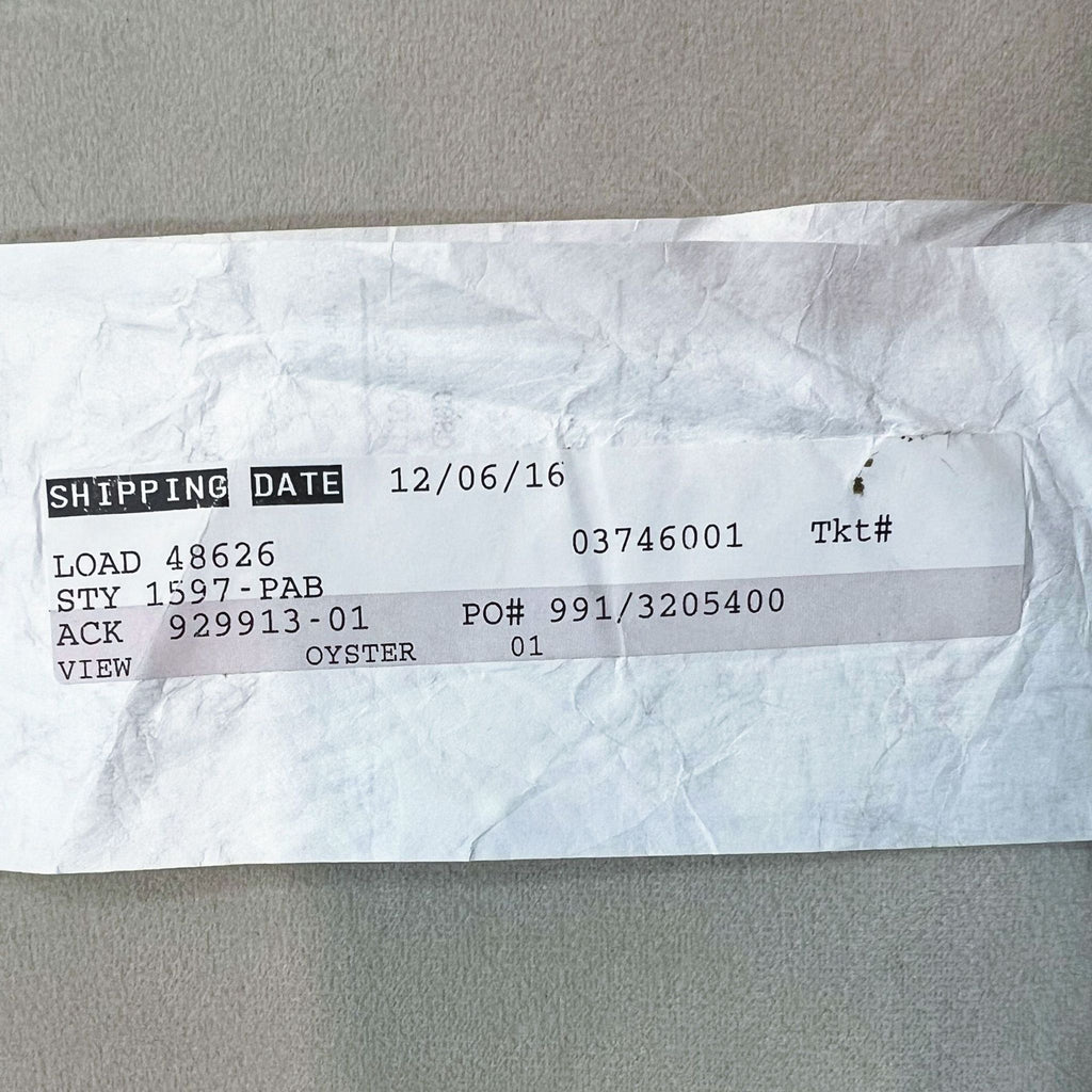 Close-up of shipping label dated 12/06/16 with product details.