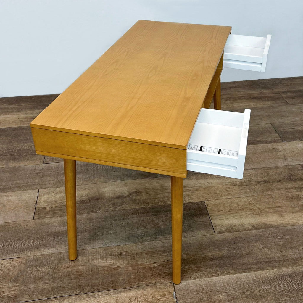 Reperch desk with teak look, two white drawers, open storage space, and tapered wood legs.