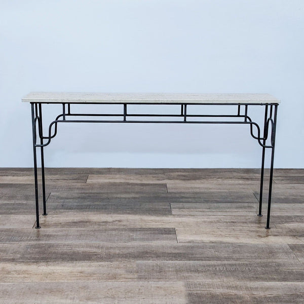 Reperch console table with elegant metal frame and stone top on wooden floor.