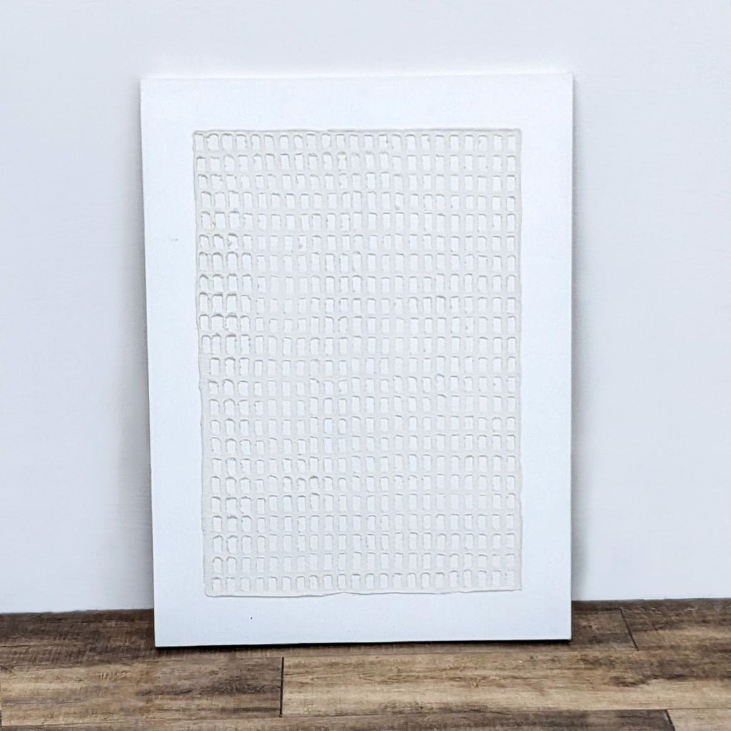 "Textured canvas with arranged small squares, part of 'Mono Vestige IV'."