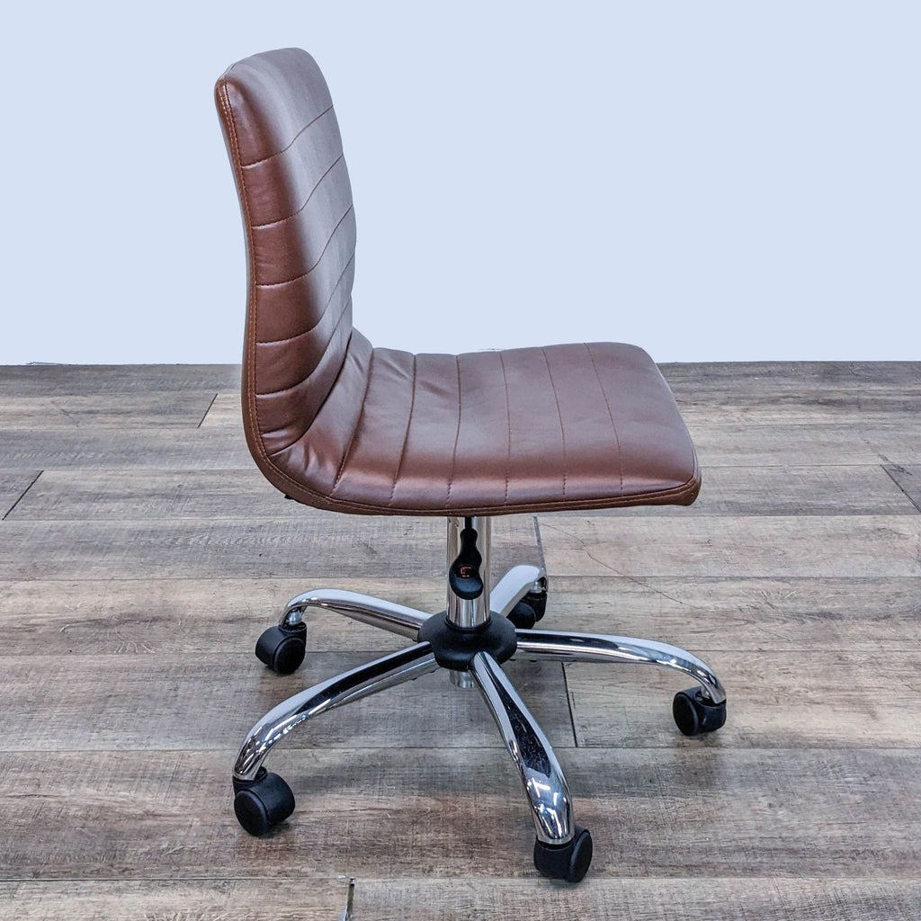 Side view of a channel-tufted brown ergonomic chair on a metal swivel base.