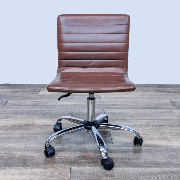 Front view of a brown faux leather office chair with swivel base and wheels.