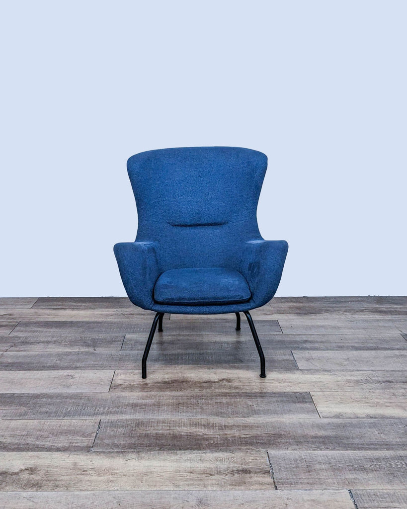 Front view of a blue modern lounge chair with angled metal legs.