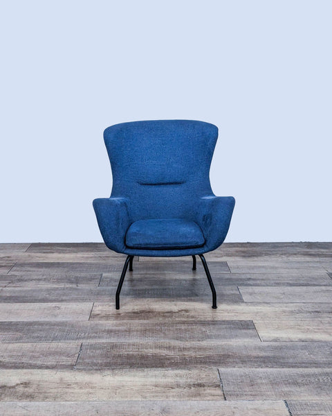 Front view of a blue modern lounge chair with angled metal legs.