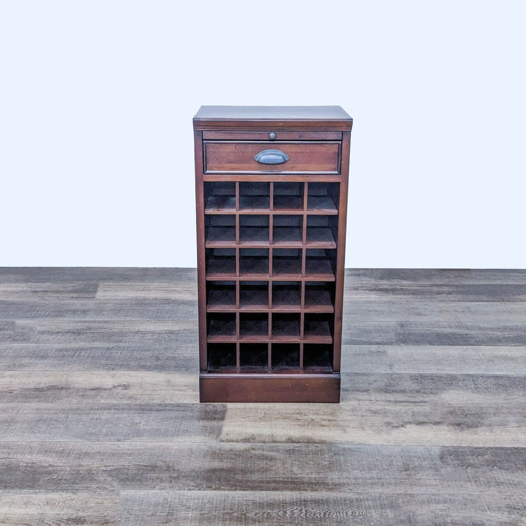 Wine storage unit with 24 bottle slots and a drawer.