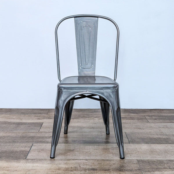 Reperch Dining Chair: Sturdy metal with tall, curved back and tapered legs. Indoor/outdoor use.