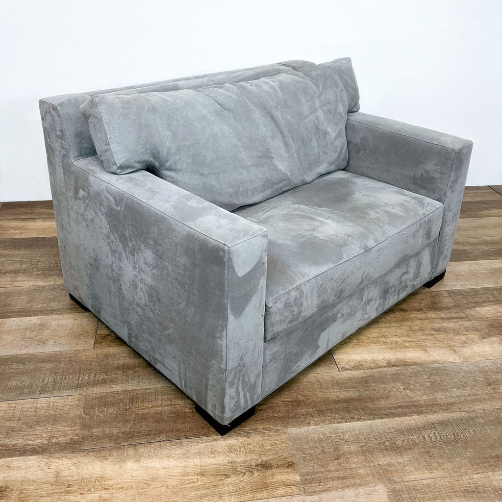 Gray Crate & Barrel memory foam twin sleeper with removable back cushions.