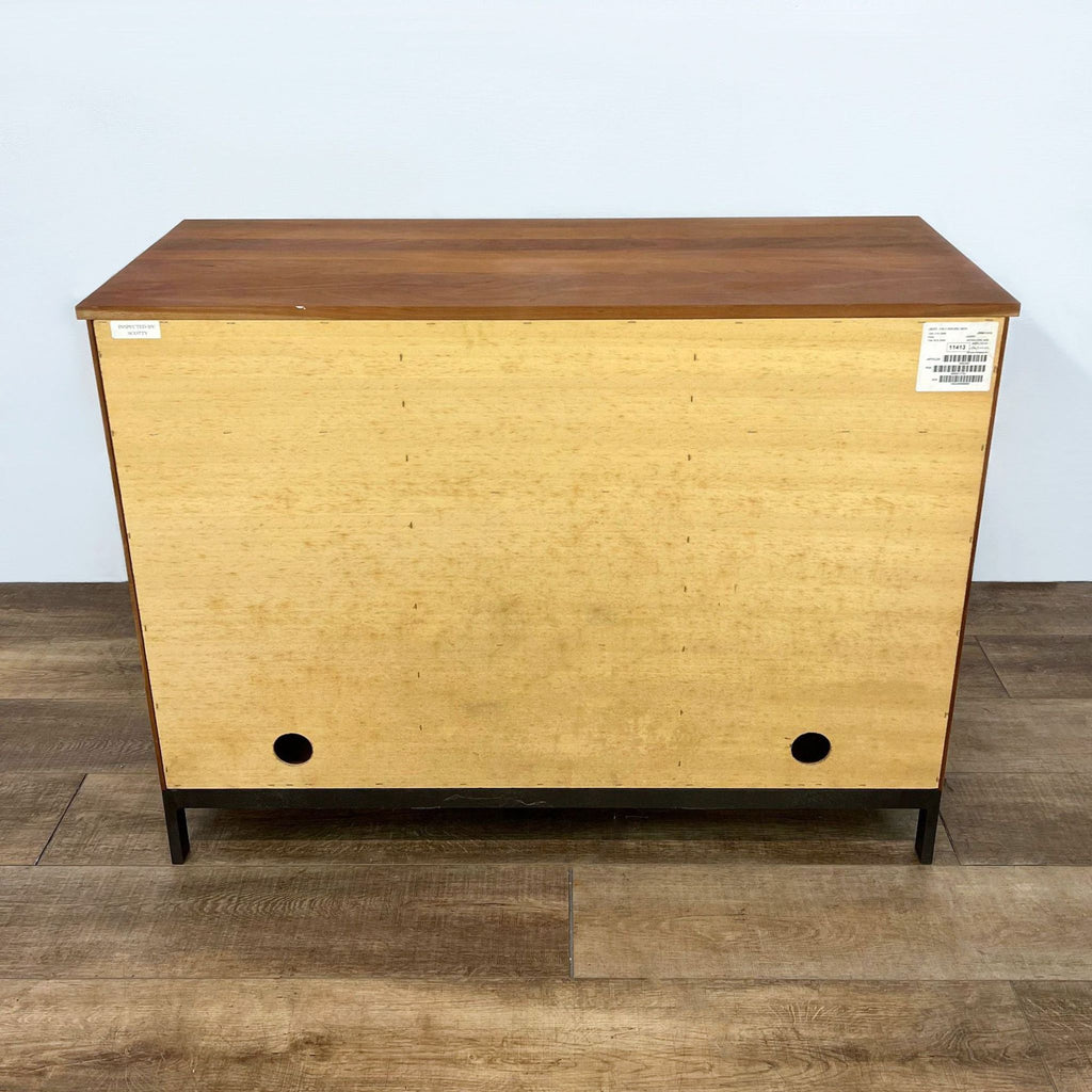 Back view of Room and Board cabinet with cherry top and natural steel base. Shows backside details.