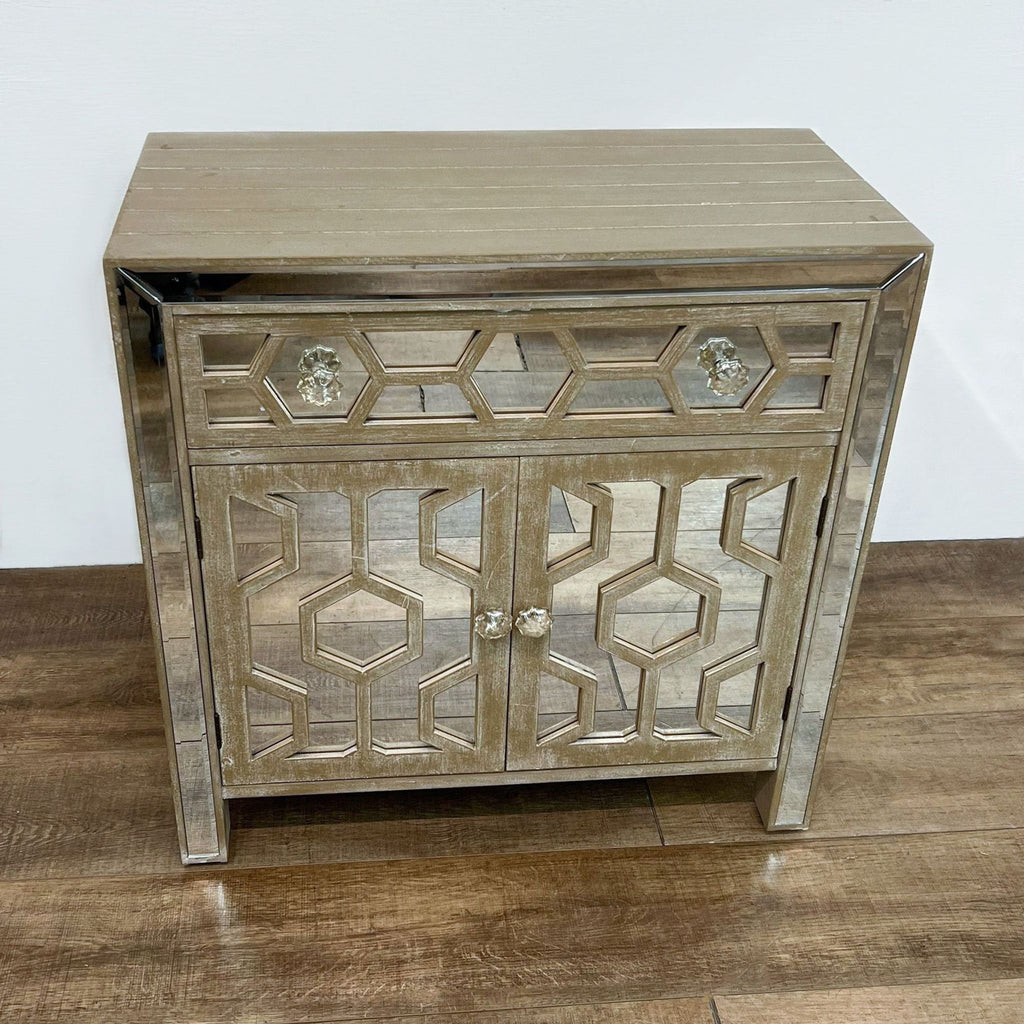 Side table with whitewashed wood, geometric cutouts, and mirror inlays from Reperch.