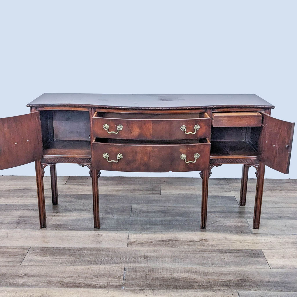 Sideboard with open cabinets and drawers for versatile storage options.