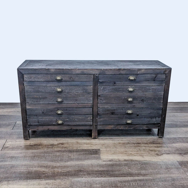 Front view of The Printmaker's Sideboard, a distressed pine dresser with multiple drawers.  