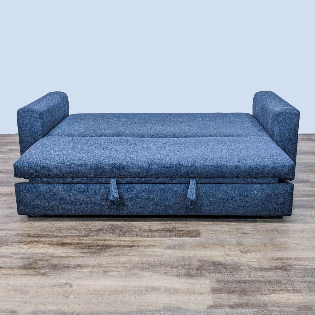 Blue bench seat daybed featuring a hidden trundle mattress for additional sleeping space.