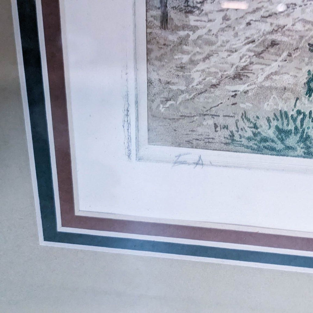 Close-up of artist's signature on French countryside art print.