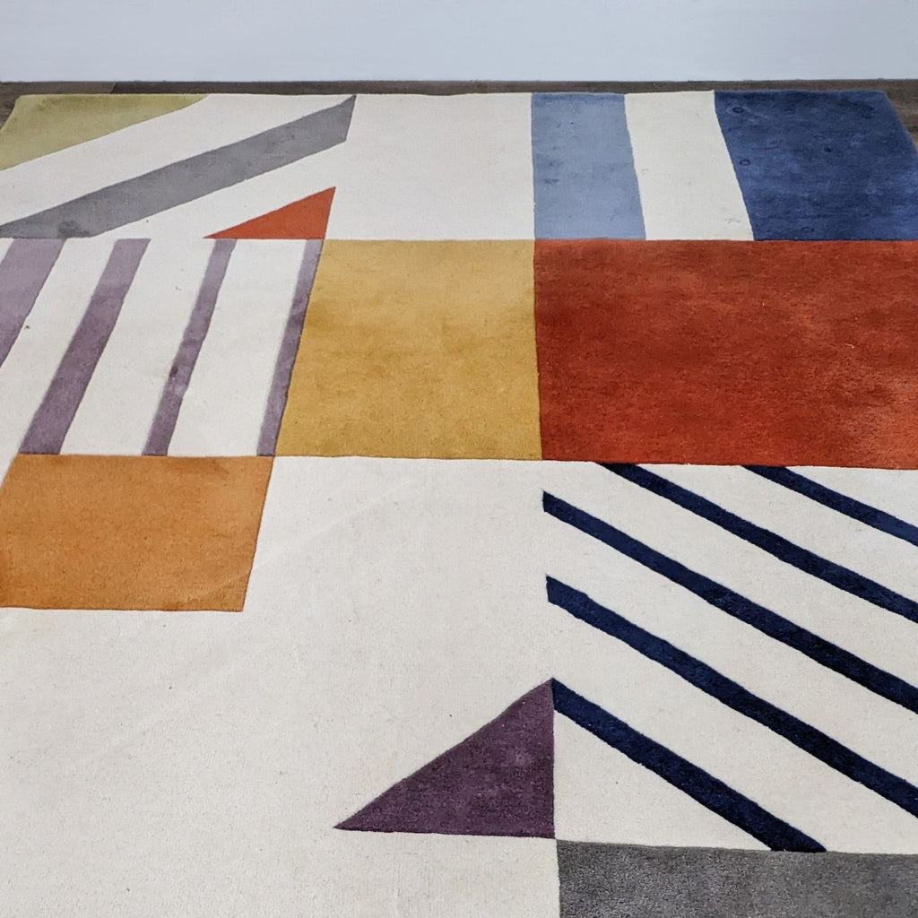 Close-up of a retro-style Safavieh rug showcasing bold geometric patterns and vibrant hues.