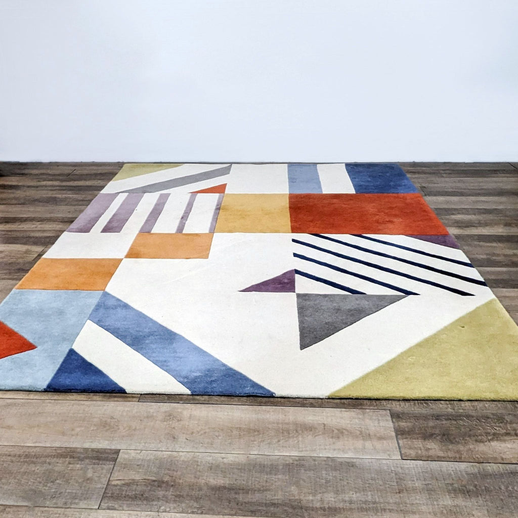 Art Deco-inspired geometric rug with vivid colors, by Safavieh, made of pure wool.