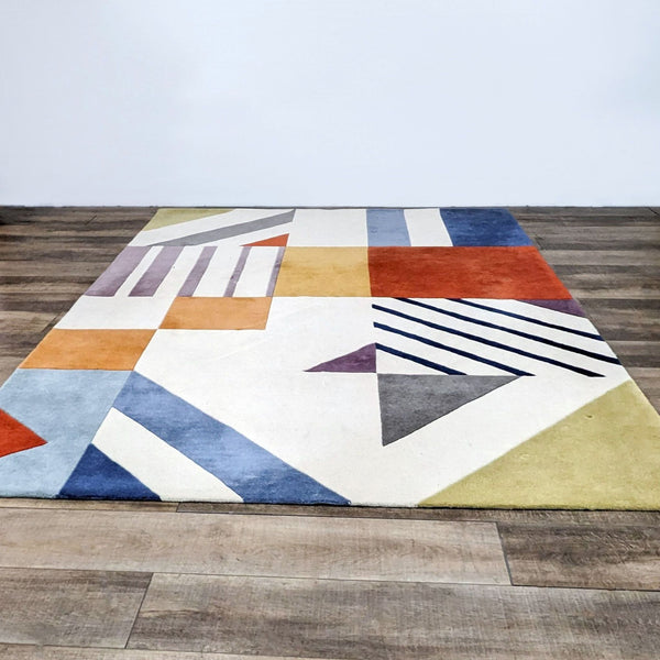 Art Deco-inspired geometric rug with vivid colors, by Safavieh, made of pure wool.