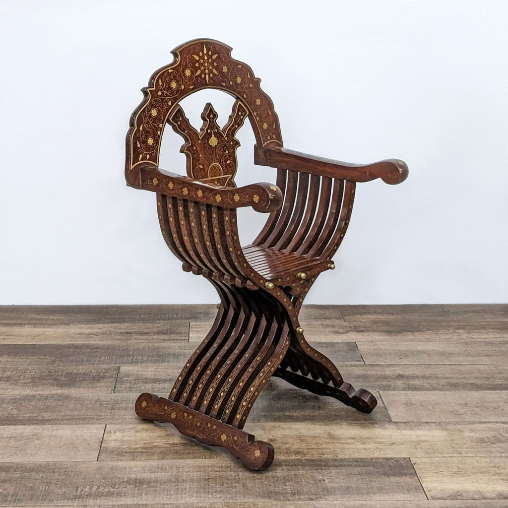 a wooden chair with a carved wooden head 