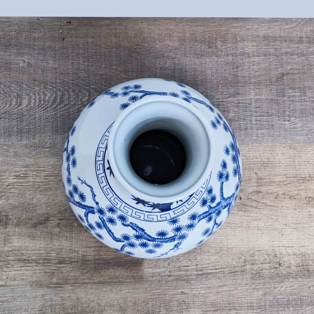 View into vase neck, highlighting the design inside and at the base.