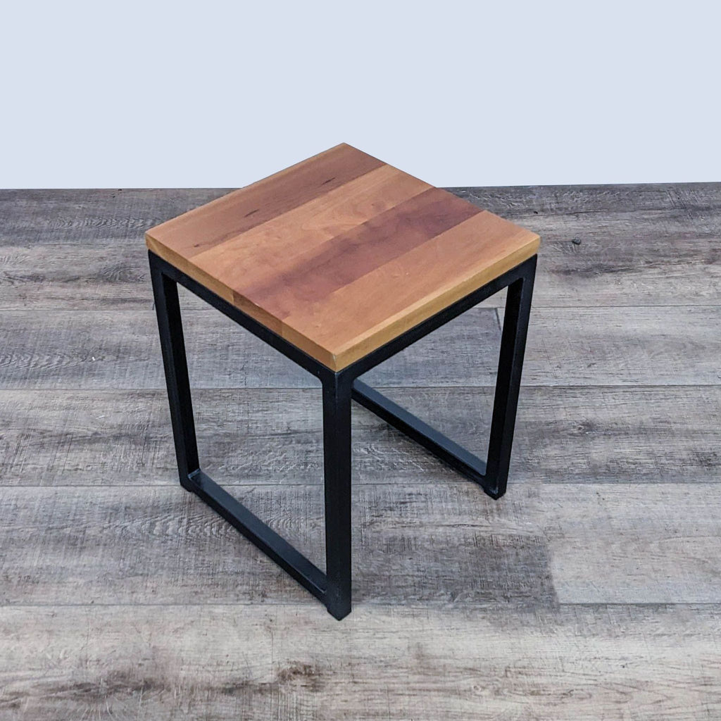 Square side table with wooden top and metal base by Reperch.