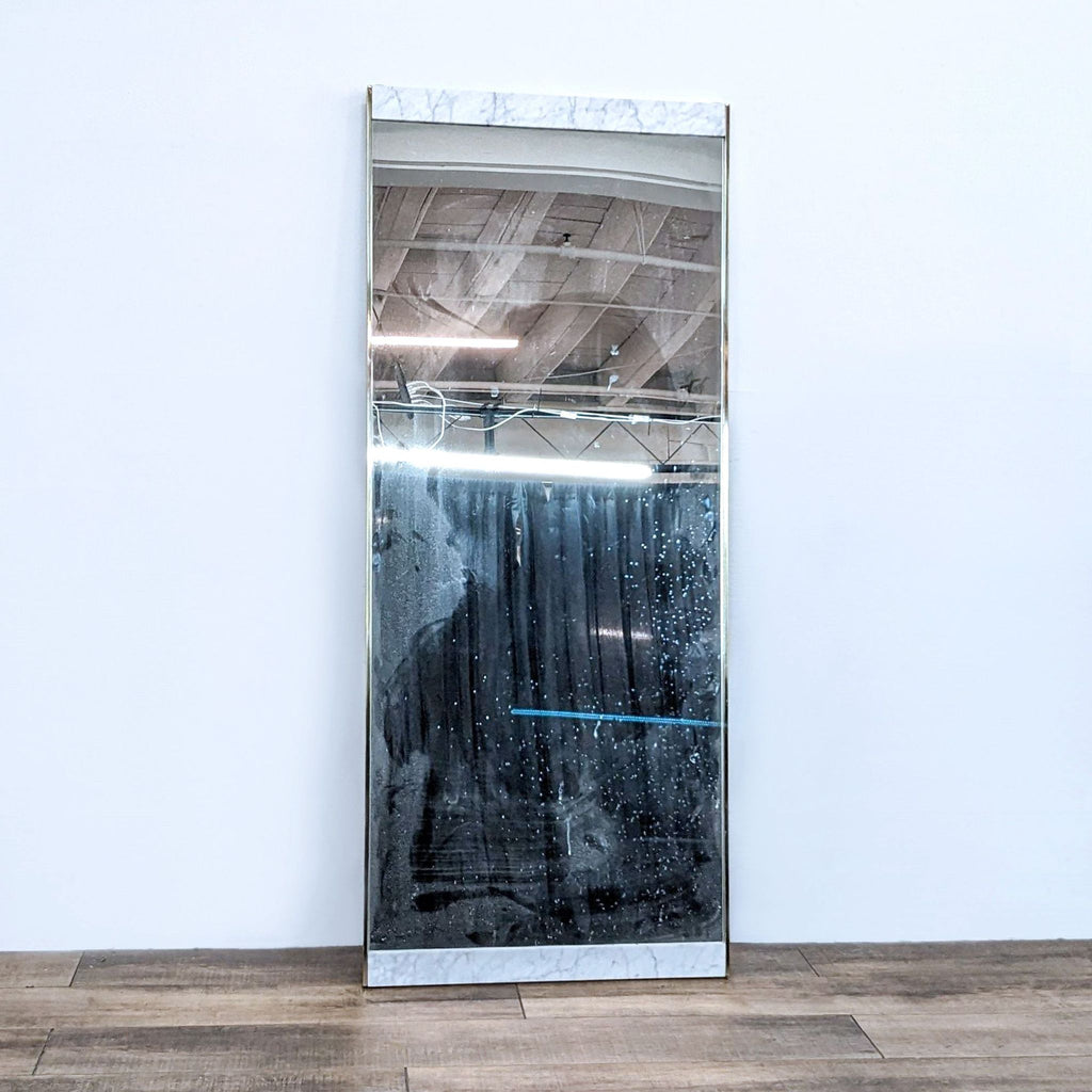 Full-length mirror by West Elm with marble and brass frame.