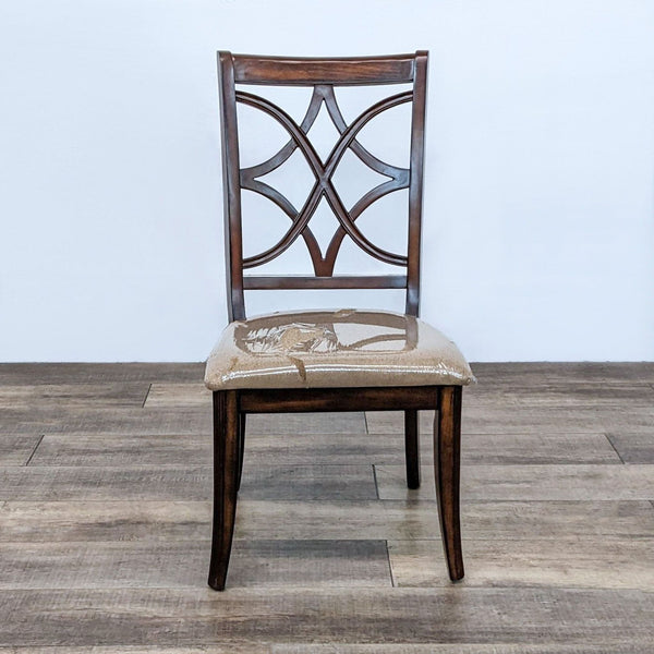 Front view of dining chair with lattice back and cushioned seat.