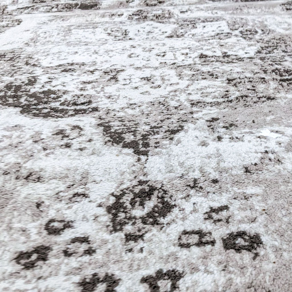 Detailed textured pattern of the Sofia Lt. Brown rug, low pile design.