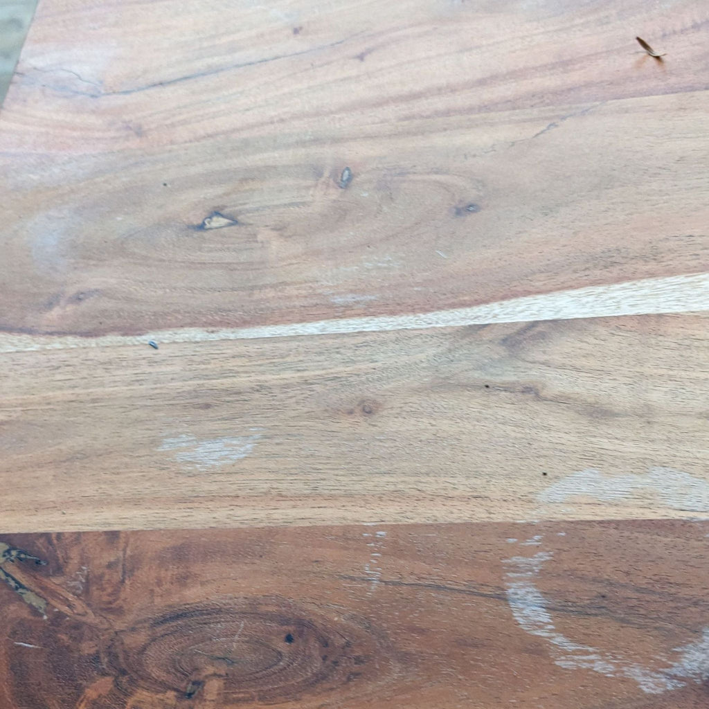 Close-up of rustic wooden tabletop with natural patterns.