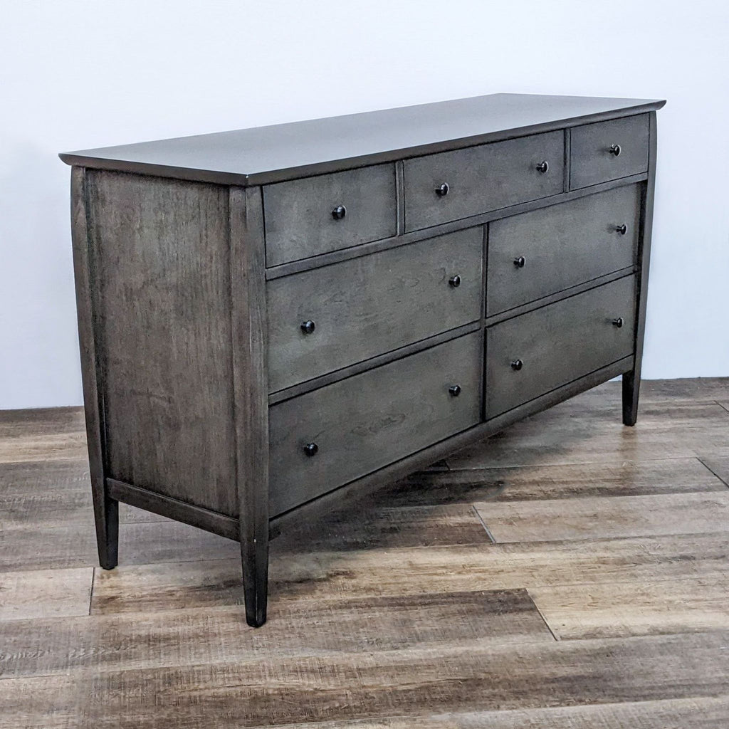 Angled view of the dresser highlighting its clean lines and elegant legs.